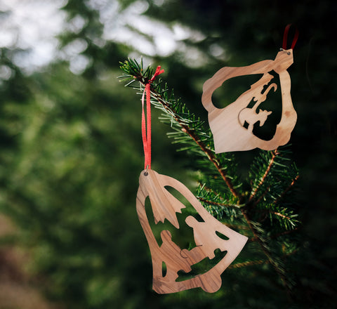 Beautiful Christmas decorations made of olive wood